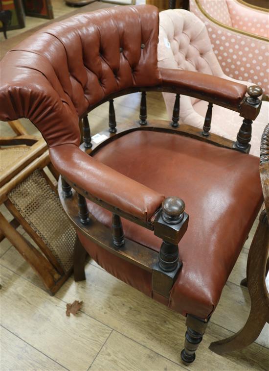 A late Victorian walnut tub chair